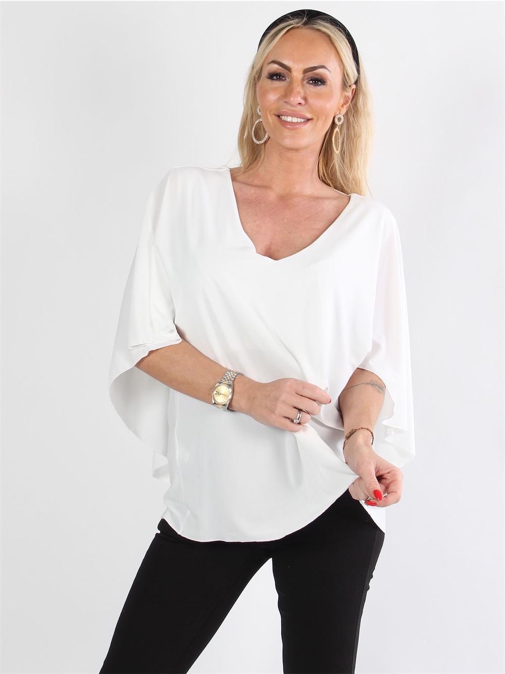 Jovana - Fin blus med fladdermusärmar och låg rygg